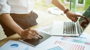 (A person can be seen designing some office wall graphics with impact)